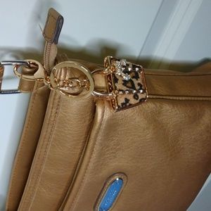 Rosetti 10" x 9" x 4" bronze faux leather adjust strap bag, NWOT, Charm Not incl